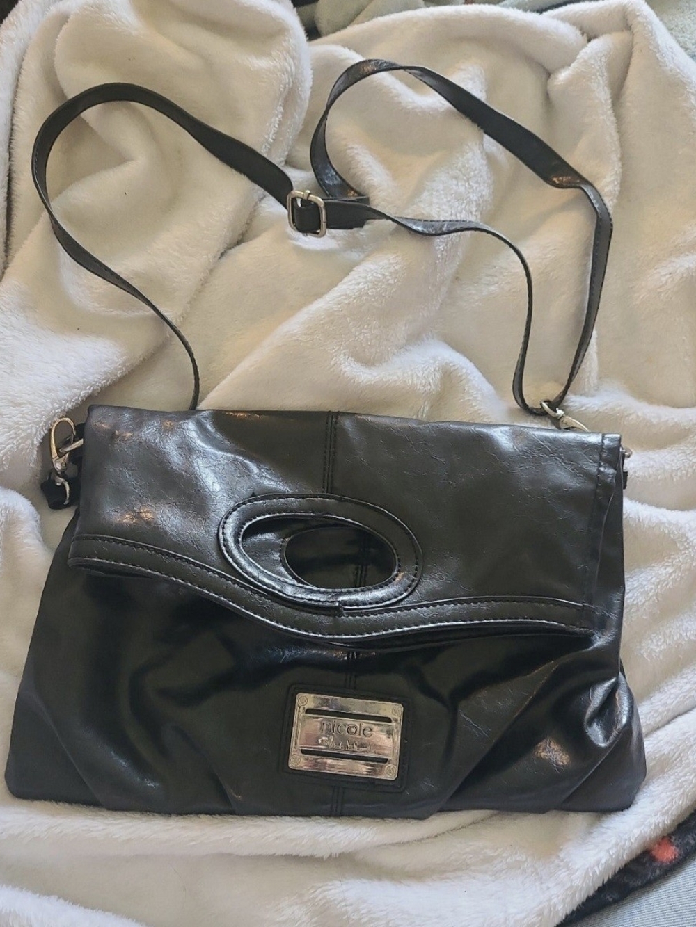 Nicole Miller Black Leather Crossbody Bag with Oval Cutout